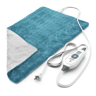 The light blue Pure Enrichment PureRelief XL Heating Pad with white cord and controller on a white background
